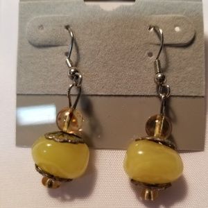 One pair of light green earrings, natural stones